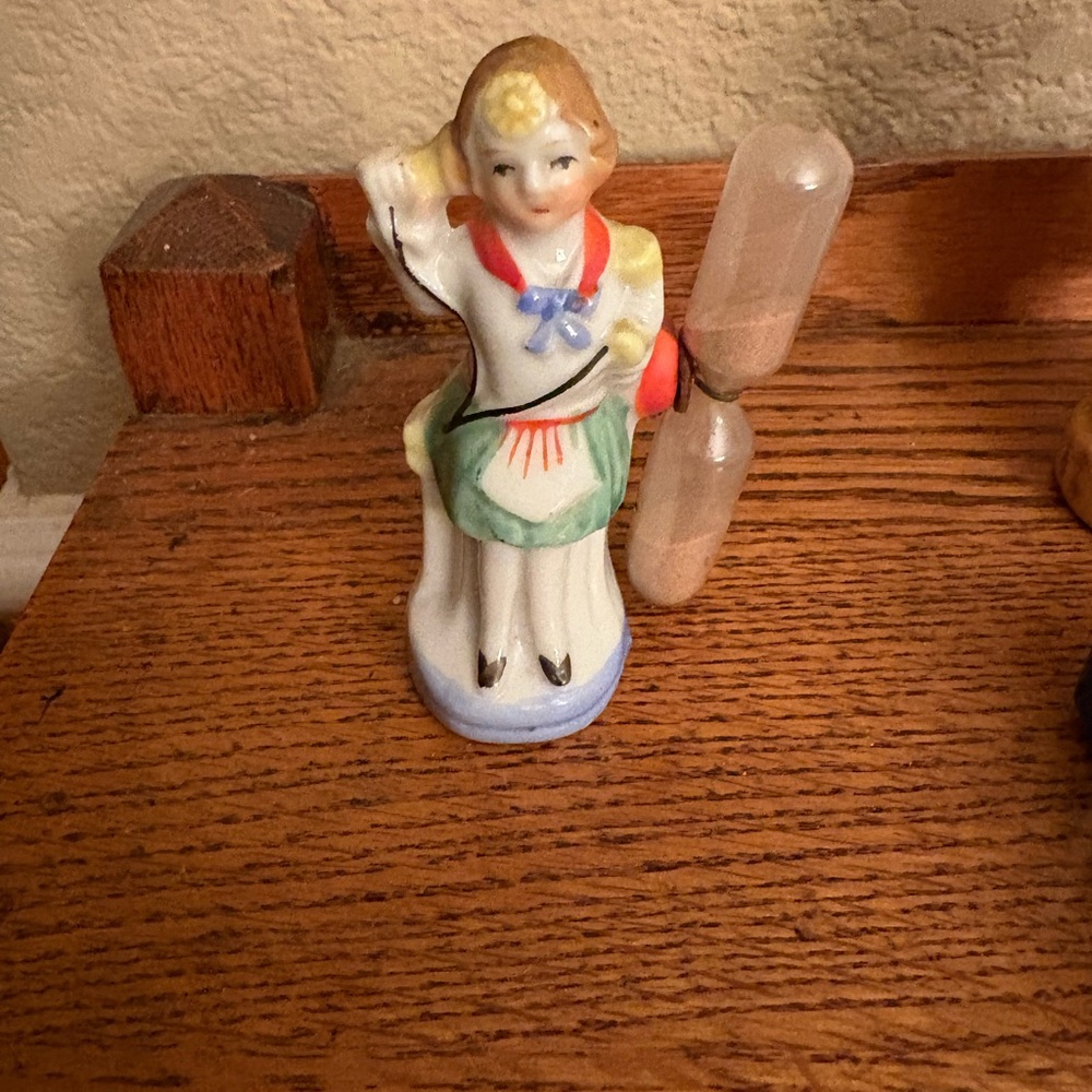 Vintage Figural 3 inch Porcelain Girl on phone, sand or egg-timer. Japan